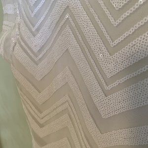 White chevron shift from White House Black Market.